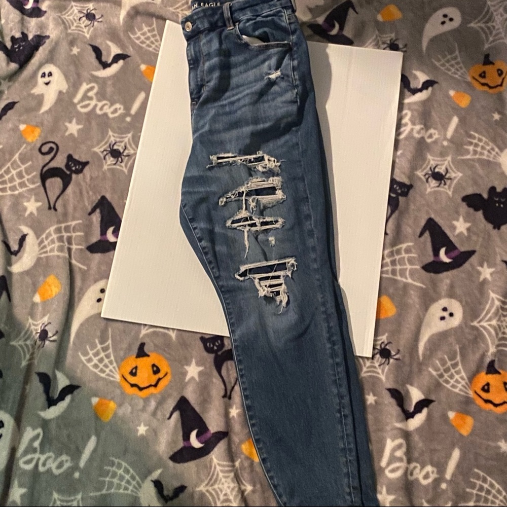 American Eagle barely worn next level stretch ripped patched jeans.